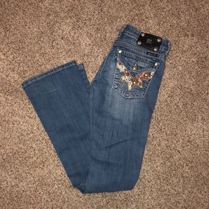 RARE Cowhide miss me jeans!